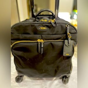 TUMI Compact 4 wheeled rolling BriefBag Black Nylon leather tabsw/gold zippers
